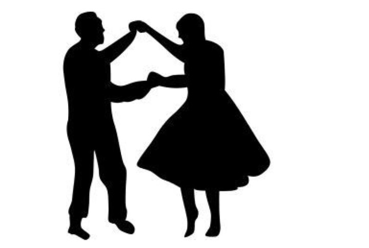Årsmøte og dans En svart silhuett av en mann og ei kvinne som danser swing