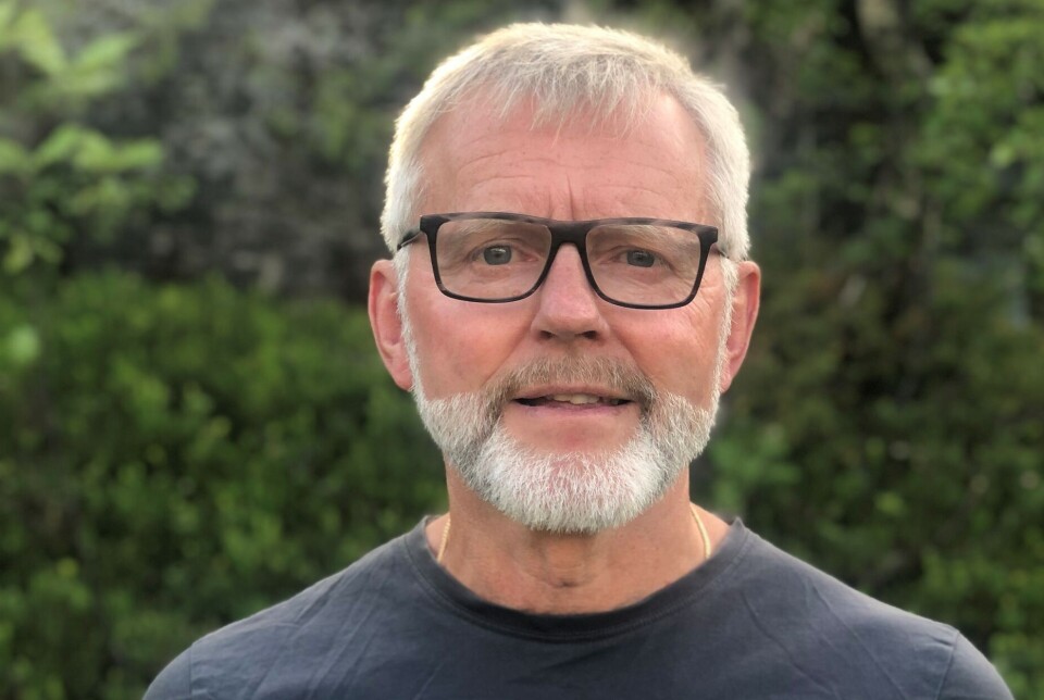 Kjell J. Larsen En mann med briller og sort t-skjorte hvor det står 'Grønn'