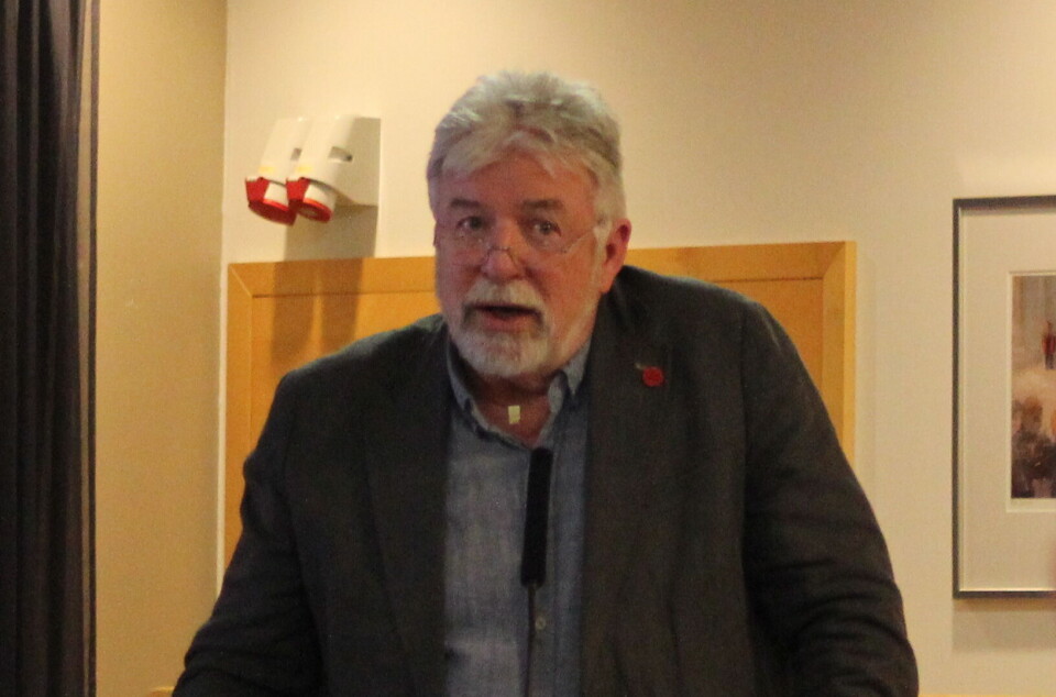 Trond Håskjold En mann på en talerstol i et møte.