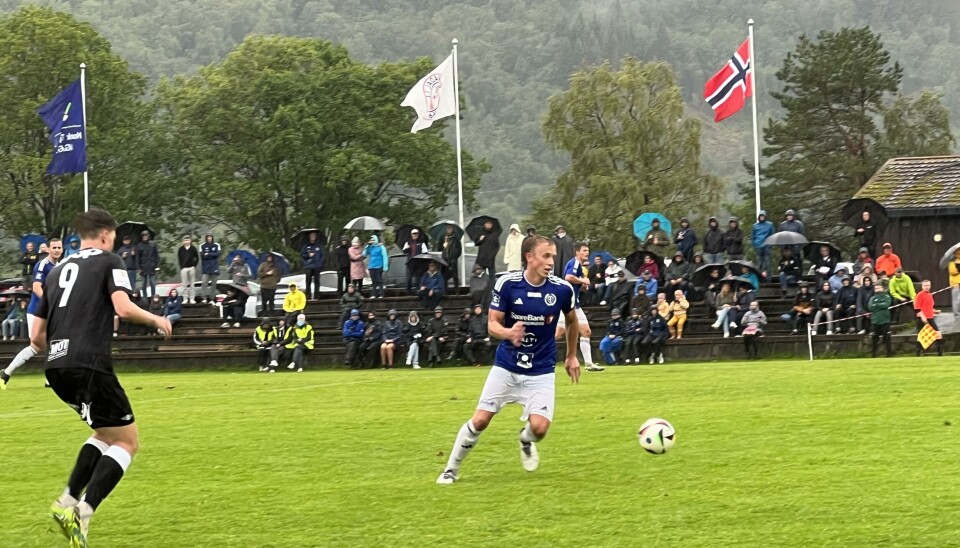 fotballspillere på bane Surnadal IL mot RBK
