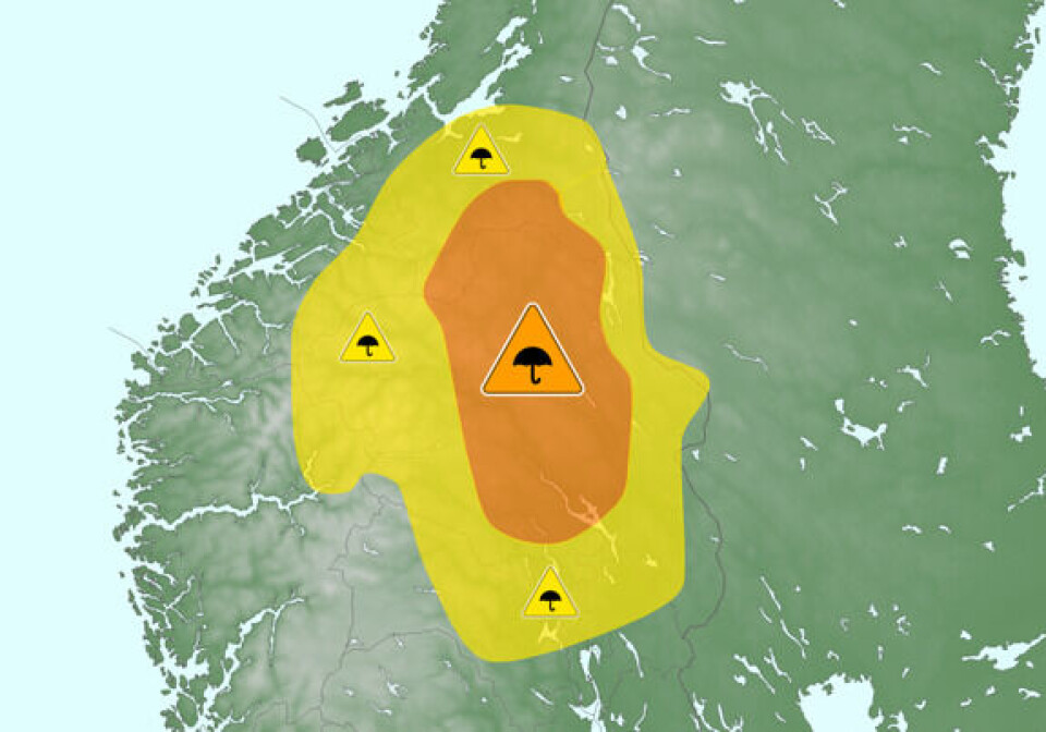 Kart som viser oppdaterte farevarsler for regn fra Meteorologisk institutt mandag 9. september. Kart med inntegnet farevarsel