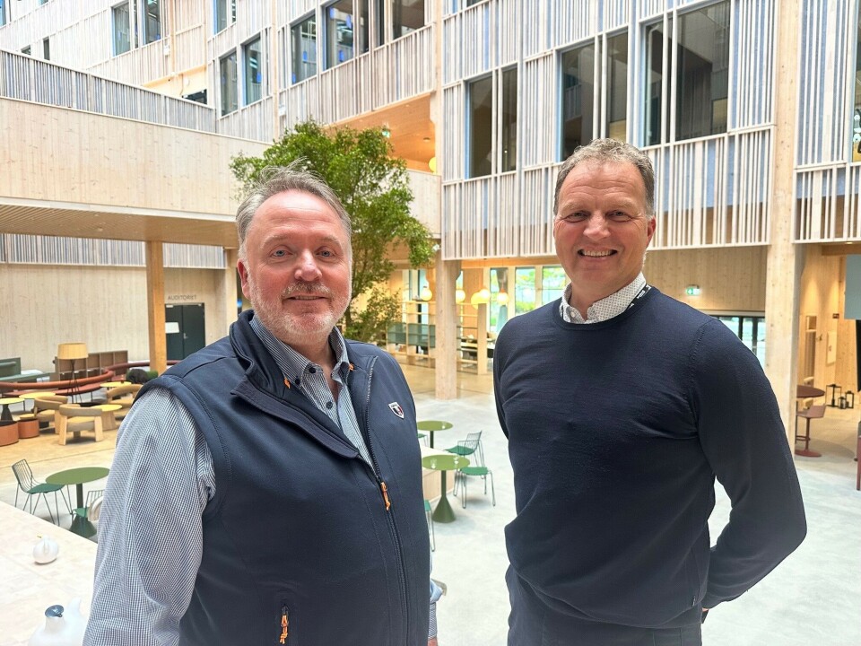 Rolf Einar Sæter og Allan Troelsen. To menn som smiler mot kamera.