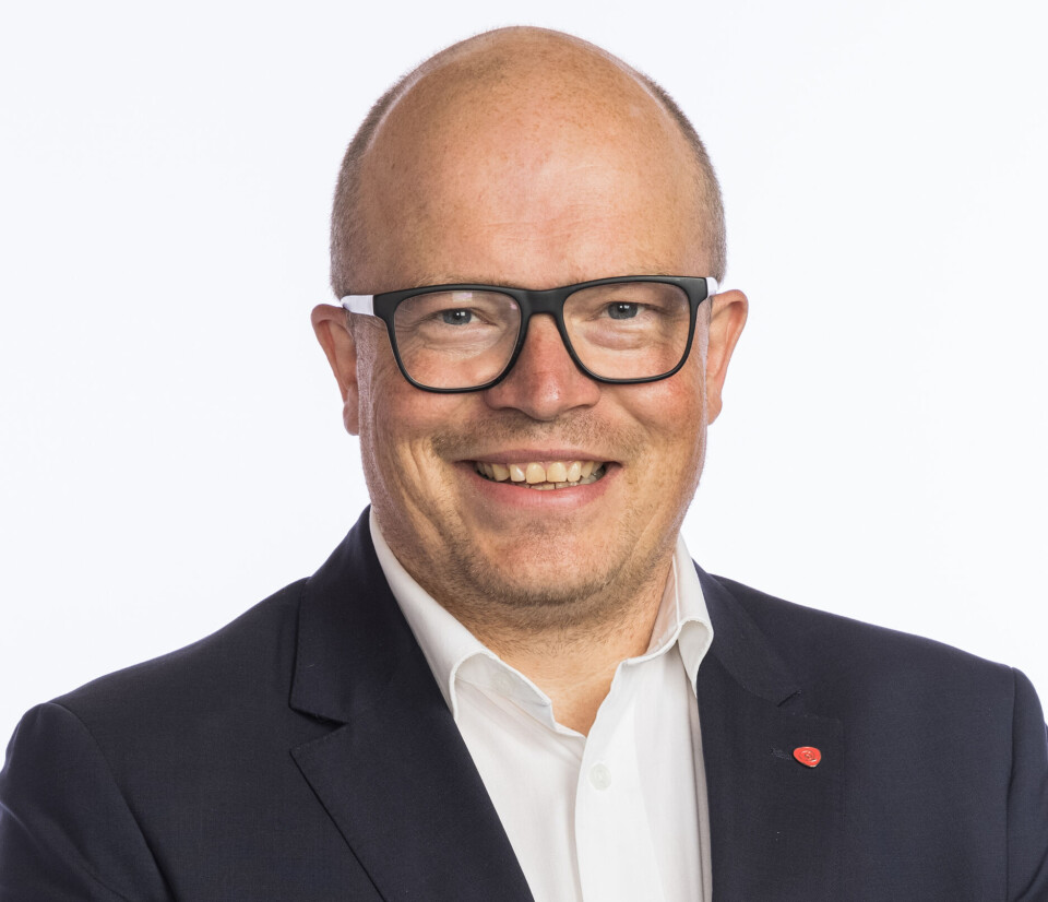 Per Vidar Kjølmoen. Mann med hvit skjorte og dressjakke.