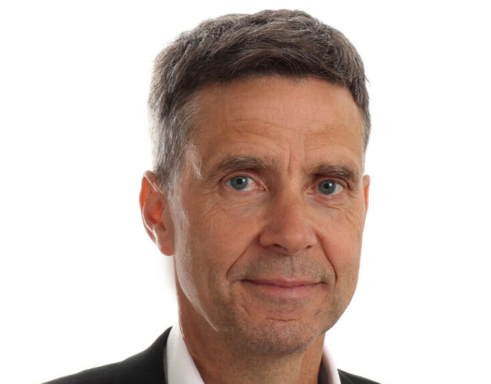 Erik Rolfsen Mann i hvit skjorte og derssjakke