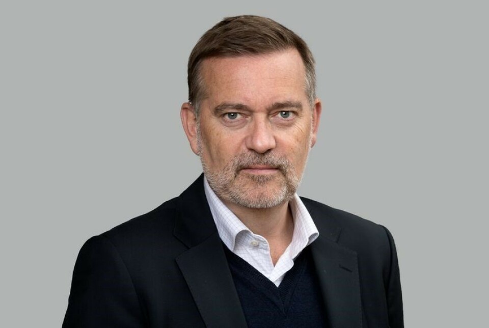 Jan-Erik Larsen. Portrettbilde av en mann.