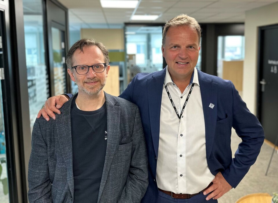 Einar Bergem, administrerende direktør i SpareBank 1 Økonomipartner og Allan Troelsen, styreleder i SpareBank 1 Økonomipartner/administrerende direktør i SpareBank 1 Nordmøre. To menn i et kontorlokale.